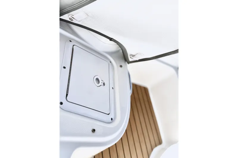 Slide: The Image of 2017 Avon Seasport 420 boat interior with storage compartment and wooden flooring. - 17