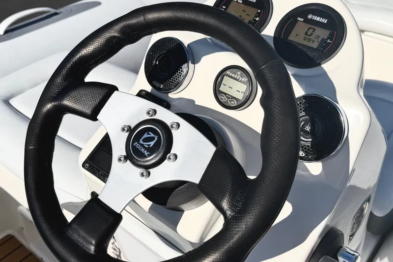 Slide: The Image of Steering wheel and dashboard of 2017 Avon Seasport 420 boat with Yamaha gauges. - 7