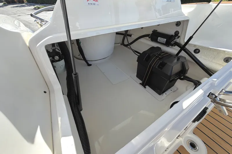 Slide: The Image of 2017 Avon Seasport 420 boat interior showing storage compartment and equipment. - 9
