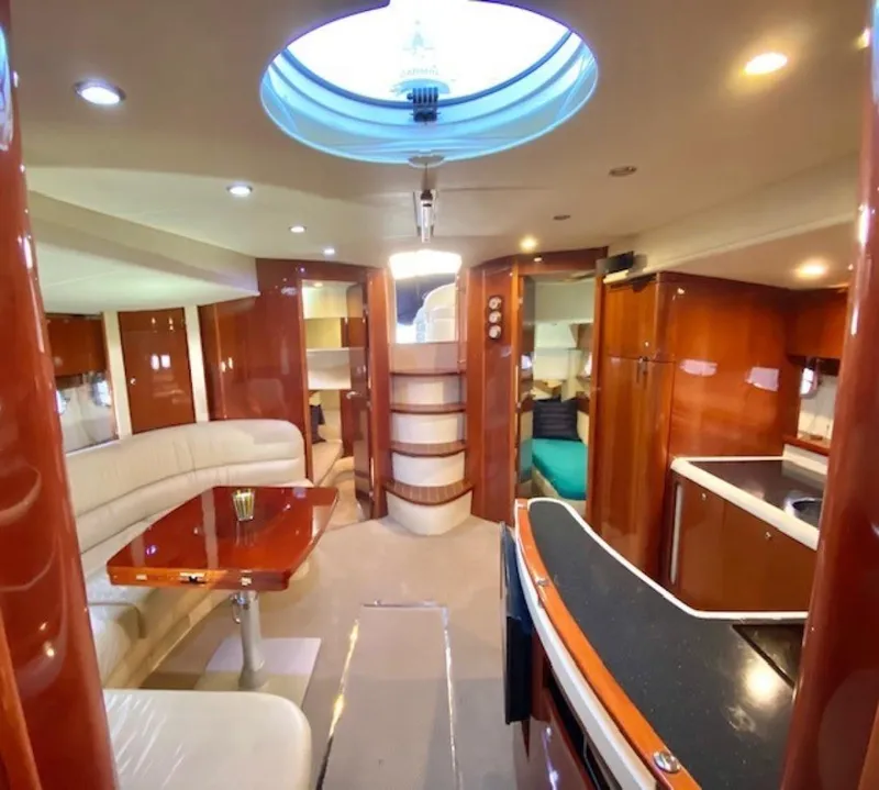 Slide: The Image of Luxurious interior of 2007 Fairline Targa 52 yacht with elegant wood finishes. - 12