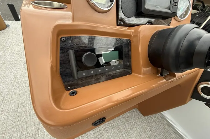 Slide: The Image of Dashboard of 2026 Avalon VENTURE 85 CRUISE with audio controls and steering wheel. - 26