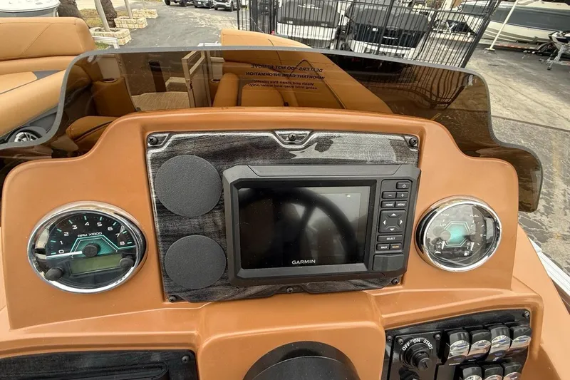 Slide: The Image of Dashboard of 2026 Avalon VENTURE 85 CRUISE with Garmin navigation system and gauges. - 28