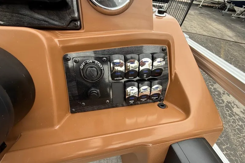 Slide: The Image of Control panel of 2026 Avalon VENTURE 85 CRUISE boat with switches and ignition. - 30