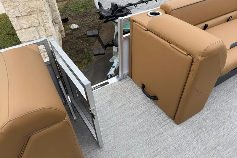 Slide: The Image of 2026 Avalon VENTURE 85 CRUISE boat interior with tan seating and open gate. - 35