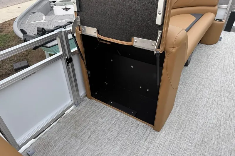 Slide: The Image of Avalon VENTURE 85 CRUISE 2026 boat interior with open storage compartment and seating. - 36