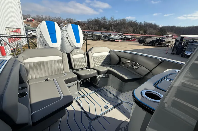 Slide: The Image of 2026 Sunsation 32 CCX boat interior with luxurious seating and twin engines. - 8