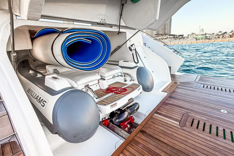 Slide: The Image of Luxury yacht Princess S65 Sportbridge 2026 with tender and rolled mats on deck. - 114