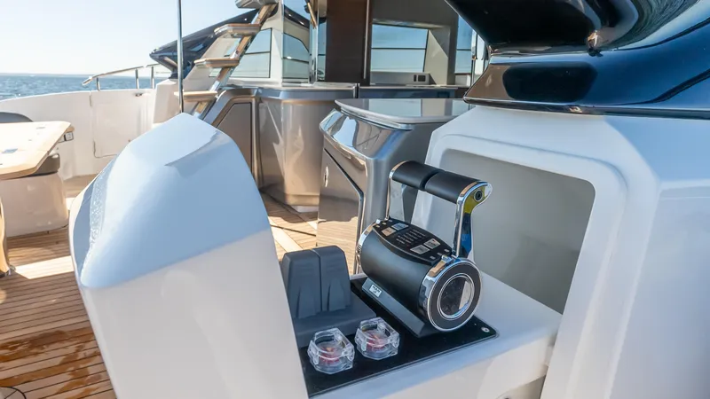 Slide: The Image of Luxurious 2025 Princess S65 Sportbridge yacht with elegant deck seating and ocean view. - 13