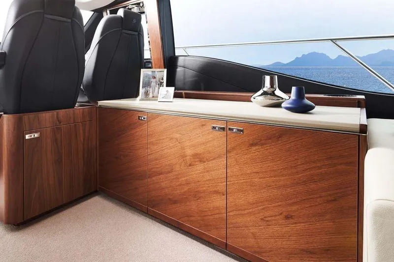 Slide: The Image of Luxurious 2026 Princess S65 Sportbridge yacht interior with modern design and ocean view. - 22