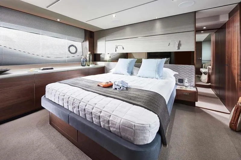 Slide: The Image of Luxurious interior of 2026 Princess S65 Sportbridge yacht with ocean view. - 25