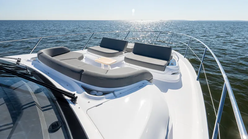 Slide: The Image of Luxurious 2026 Princess S65 Sportbridge yacht helm with advanced navigation displays. - 42