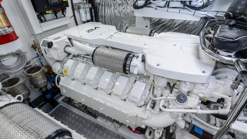 Slide: The Image of Interior view from 2026 Princess S65 Sportbridge yacht, overlooking serene blue waters and palm trees. - 48