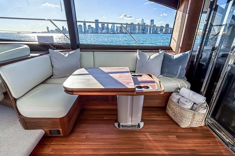 Slide: The Image of Luxurious interior of 2026 Princess S65 Sportbridge yacht with city skyline view. - 51