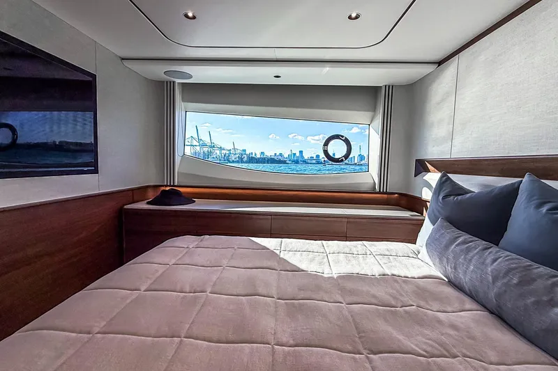 Slide: The Image of Luxurious interior of 2026 Princess S65 Sportbridge yacht with scenic ocean view. - 56