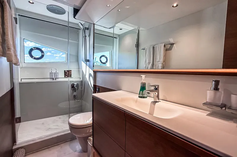 Slide: The Image of Luxurious bathroom on 2026 Princess S65 Sportbridge yacht with modern fixtures and elegant design. - 59