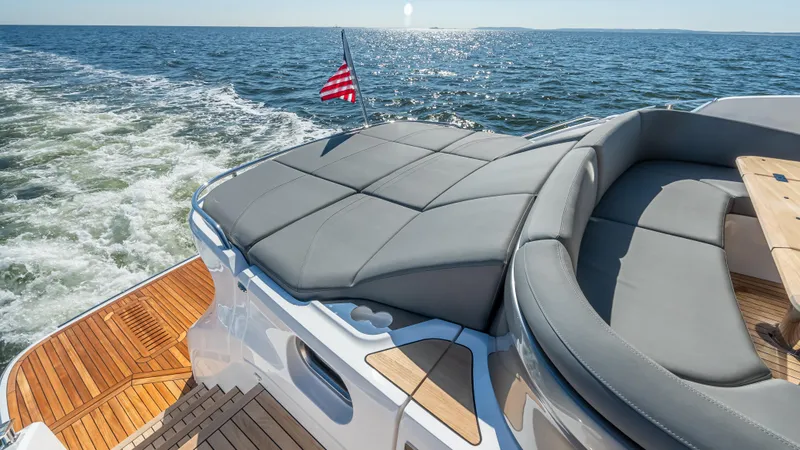 Slide: The Image of 2026 Princess S65 Sportbridge yacht cruising on open sea, showcasing luxury and elegance. - 6