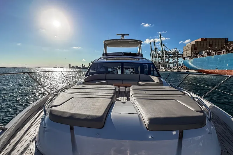 Slide: The Image of Luxurious 2026 Princess S65 Sportbridge yacht docked in a sunny harbor. - 79