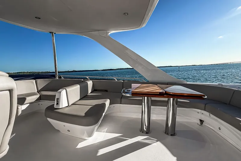 Slide: The Image of Luxurious 2026 Princess S65 Sportbridge yacht interior with elegant seating and ocean view. - 97
