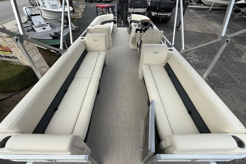 Slide: The Image of 2026 Avalon VLS Quad Lounge boat with spacious seating and modern design. - 10
