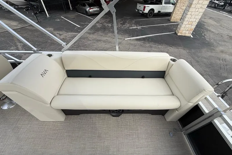 Slide: The Image of 2026 Avalon VLS Quad Lounge with beige seating on a boat deck. - 15