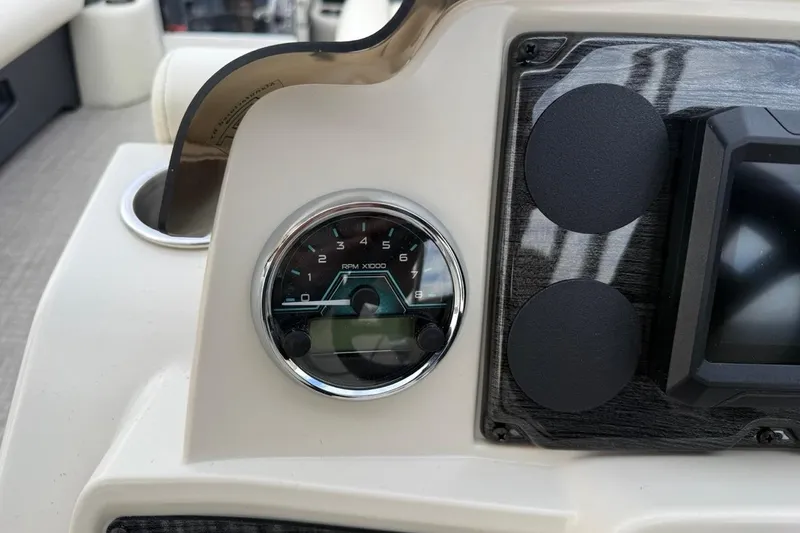 Slide: The Image of Close-up of 2026 Avalon VLS Quad Lounge dashboard with RPM gauge. - 22