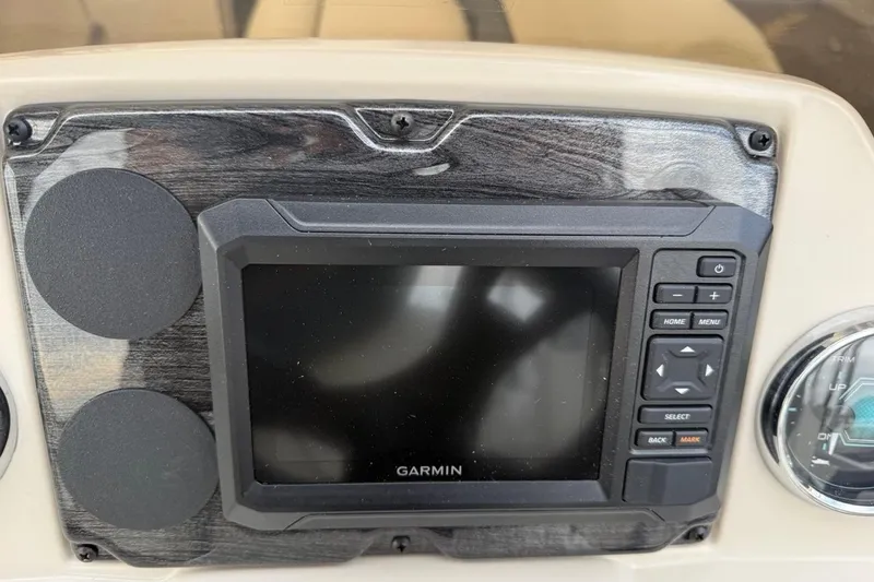 Slide: The Image of Garmin display on 2026 Avalon VLS Quad Lounge boat dashboard, featuring control buttons. - 23