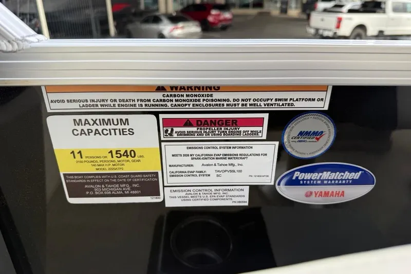 Slide: The Image of Warning and capacity labels on 2026 Avalon VLS Quad Lounge boat. - 28