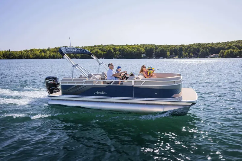 Slide: The Image of 2026 Avalon VLS Quad Lounge pontoon boat with Yamaha motor on trailer. - 5