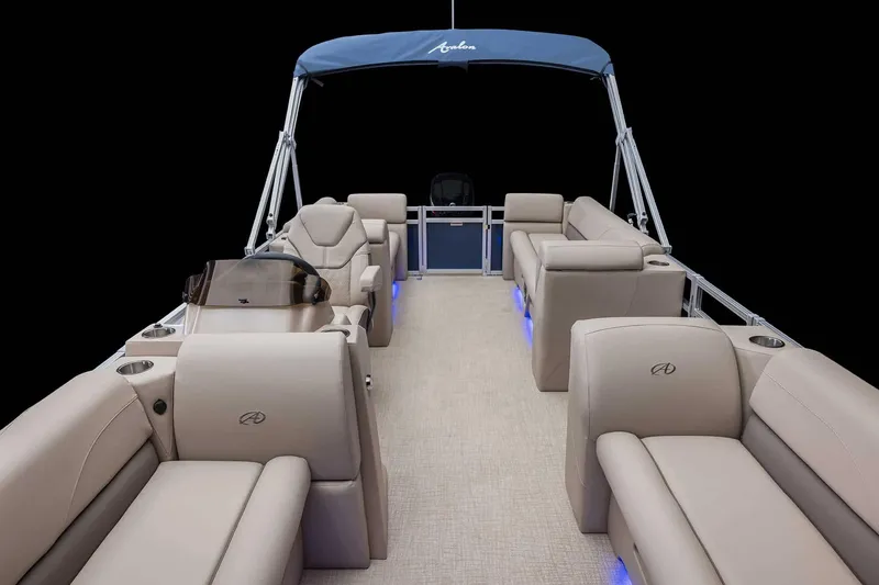 Slide: The Image of 2026 Avalon VLS Quad Lounge pontoon boat on trailer with Yamaha outboard motor. - 7
