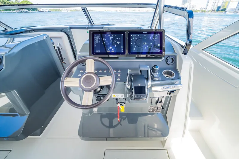 Slide: The Image of Modern helm of 2025 Catana YOT 36 yacht with dual displays and steering wheel. - 20