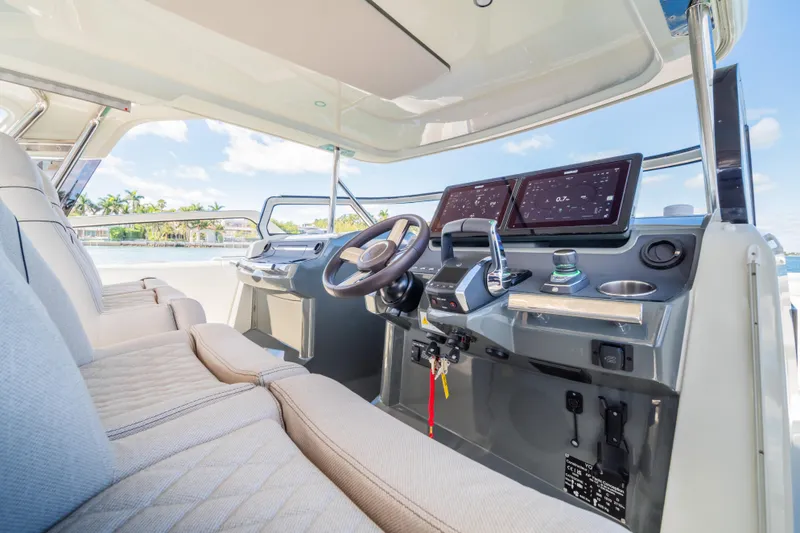 Slide: The Image of Luxurious 2025 Catana YOT 36 yacht cockpit with modern navigation systems and plush seating. - 22