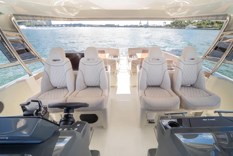 Slide: The Image of Luxurious interior of 2025 Catana YOT 36 yacht with plush seating and scenic water view. - 23