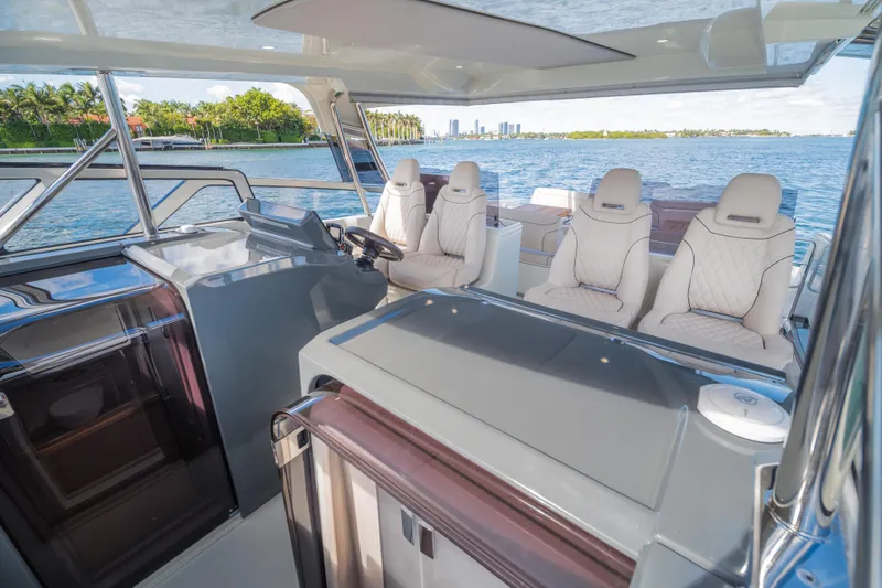 Slide: The Image of Luxurious interior of 2025 Catana YOT 36 yacht with plush seating and scenic water view. - 28