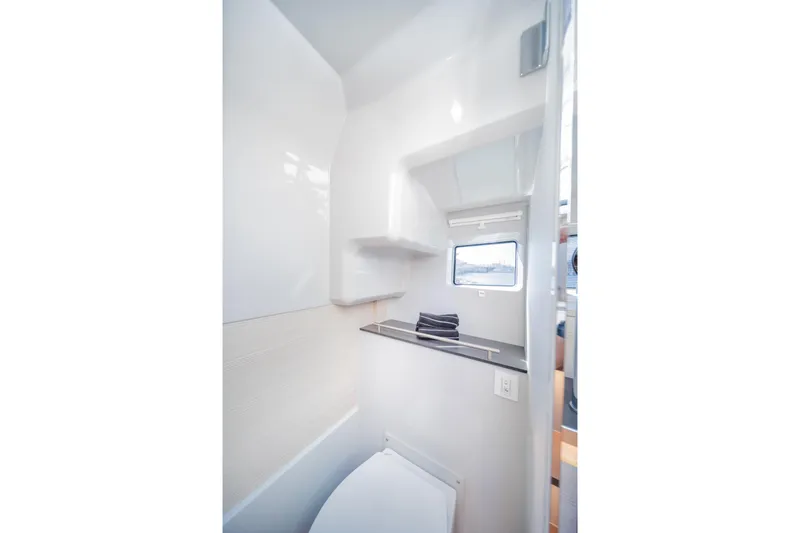 Slide: The Image of Modern bathroom interior of 2025 Catana YOT 36 yacht with sleek design and window view. - 38
