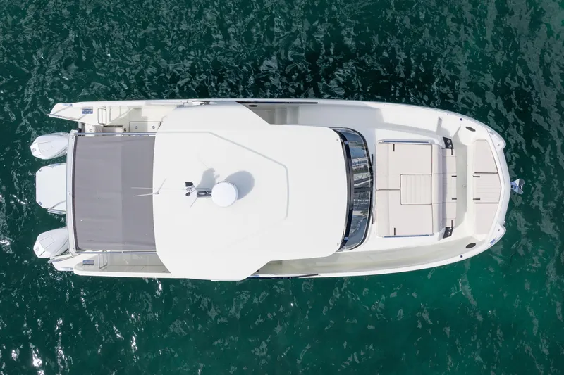 Slide: The Image of Aerial view of 2025 Catana YOT 36 boat on clear water. - 5