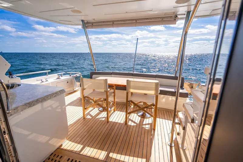 Slide: The Image of Luxurious Ocean Alexander 70E Motoryacht 2021, featuring elegant deck with ocean view. - 27