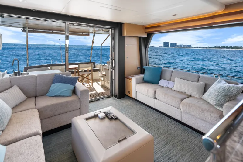 Slide: The Image of Luxurious interior of 2021 Ocean Alexander 70E Motoryacht with ocean view. - 28