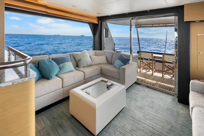 Slide: The Image of Luxurious interior of 2021 Ocean Alexander 70E Motoryacht with ocean view. - 29