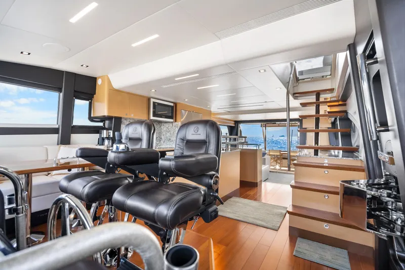 Slide: The Image of Luxurious interior of 2021 Ocean Alexander 70E Motoryacht with modern seating and ocean view. - 39