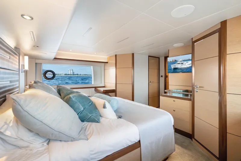 Slide: The Image of Luxurious bedroom interior of 2021 Ocean Alexander 70E Motoryacht with ocean view. - 41