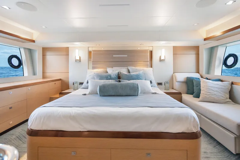 Slide: The Image of Luxurious bedroom interior of 2021 Ocean Alexander 70E Motoryacht with ocean view windows. - 42