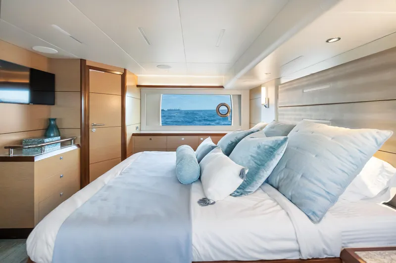 Slide: The Image of Luxurious bedroom interior of 2021 Ocean Alexander 70E Motoryacht with ocean view. - 43