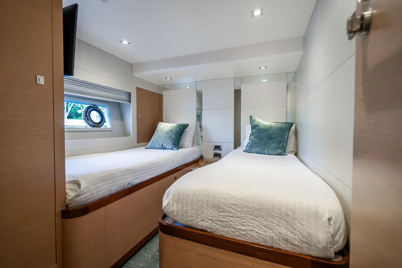 Slide: The Image of Luxurious twin cabin in 2021 Ocean Alexander 70E Motoryacht, featuring modern design and comfort. - 51