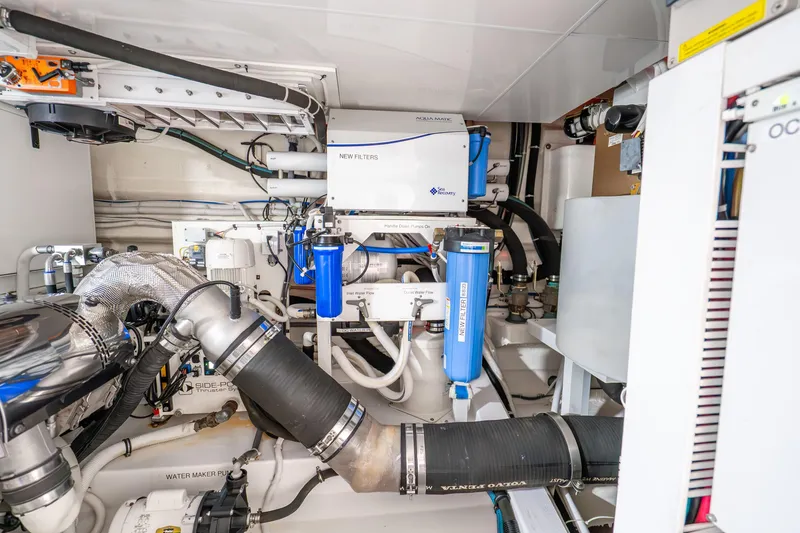 Slide: The Image of Engine room of 2021 Ocean Alexander 70E Motoryacht with advanced filtration system. - 66