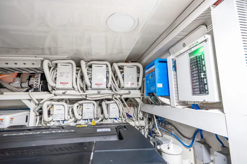 Slide: The Image of Engine room of 2021 Ocean Alexander 70E Motoryacht with advanced electrical systems. - 67