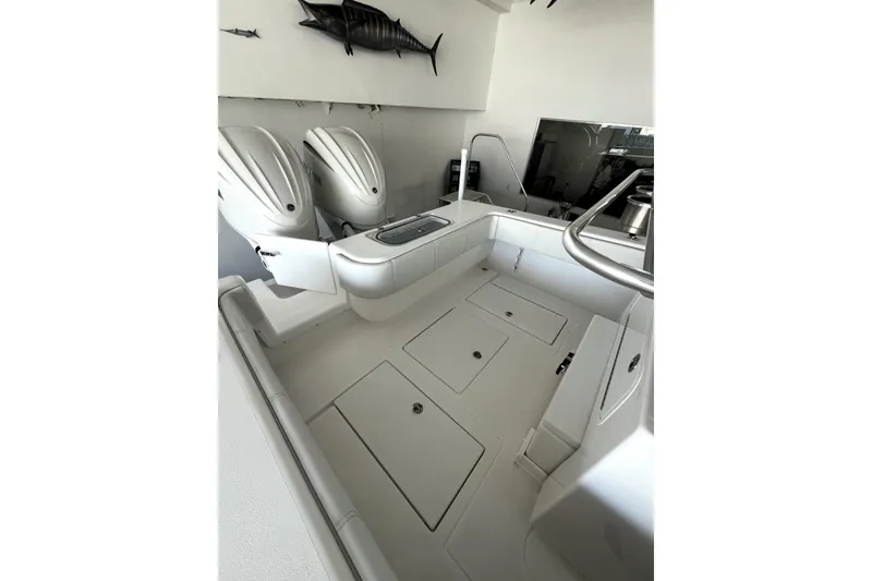 Slide: The Image of 2026 Contender boat interior with dual engines and sleek design. - 13