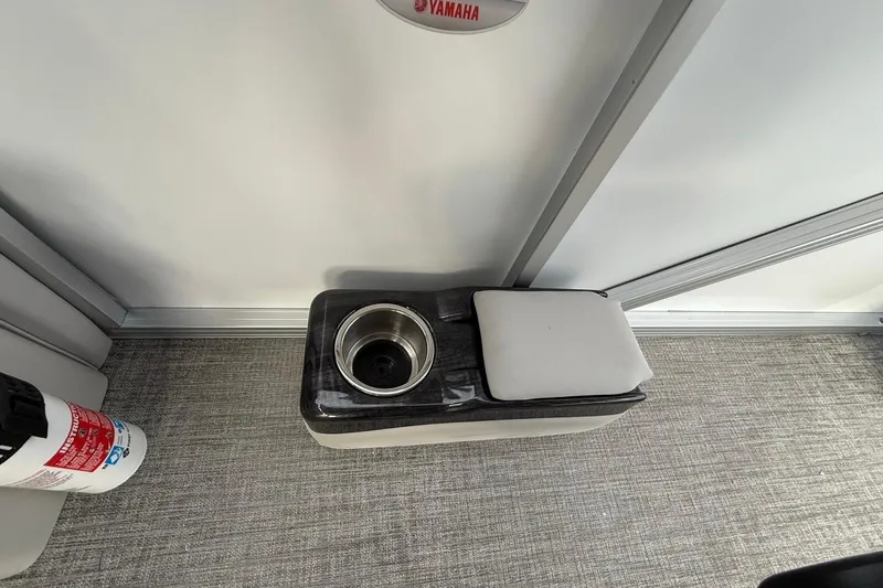 Slide: The Image of 2026 Avalon LSZ Versatile Rear Bench Windshield interior with cup holder and cushion. - 30