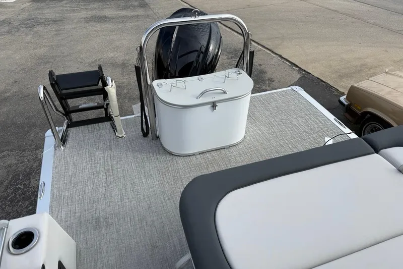 Slide: The Image of 2026 Avalon LSZ Versatile Rear Bench Windshield boat deck with seating and storage. - 41