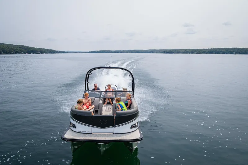 Slide: The Image of 2026 Avalon LSZ Versatile Rear Bench Windshield with ladder on trailer in parking lot. - 8