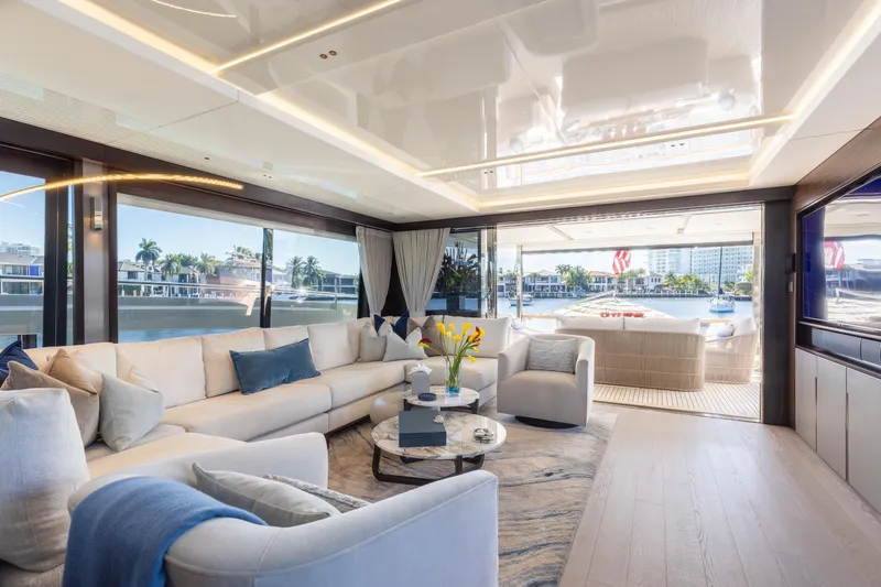 Slide: The Image of Luxurious interior of 2023 Sunseeker 90 Ocean yacht with elegant seating and waterfront view. - 10